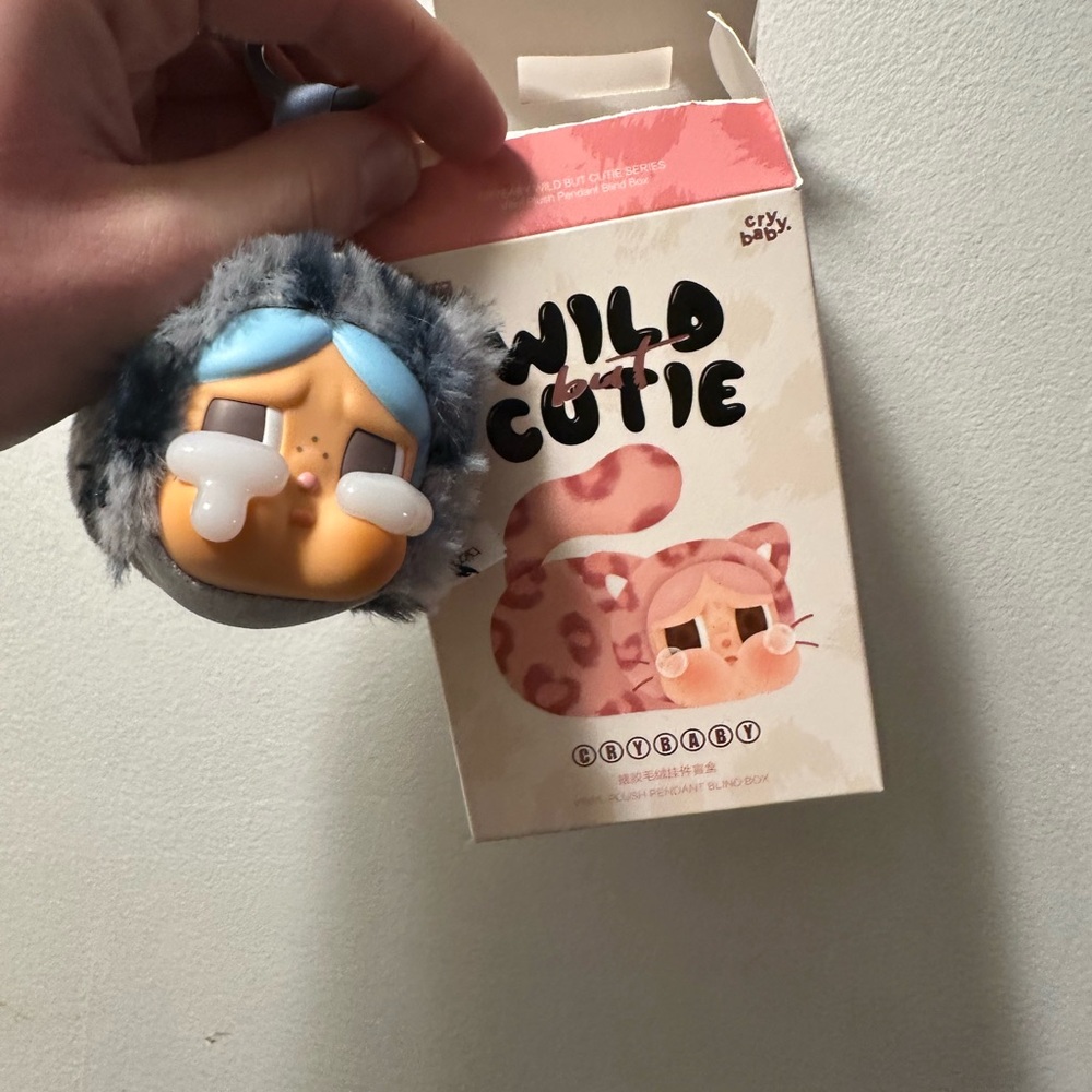 Cute Character Keychain with denim cutie .